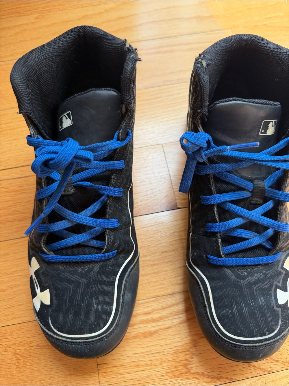 Under Armour Black High-Top baseball cleats with Blue Laces